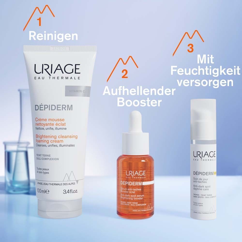 Drei Uriage Produkte: Reinigungsschaum, Aufhellender Booster, Anti-Dunkle-Flecken-Pflege. Schritte: Reinigen, Aufhellen, Mit Feuchtigkeit versorgen.