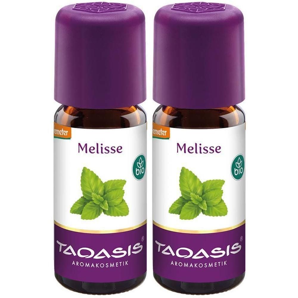 Zwei kleine braune Glasflaschen mit lila Deckeln. Auf den Etiketten steht "Melisse" und "TAOASIS". Bio-Siegel.