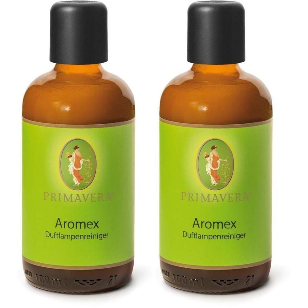 Zwei Flaschen PRIMAVERA® AromEX Duftlampenreiniger. Braune Flüssigkeit in Glasflaschen mit schwarzem Deckel und grünem Etikett.
