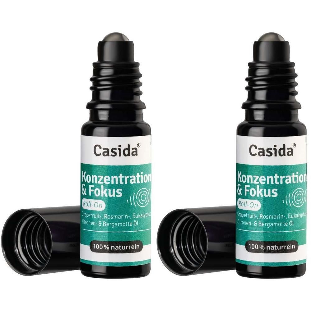Zwei Roll-On-Flaschen. Schwarze Kappe, weißes Etikett mit Text. Produktname: Casida Konzentration & Fokus Roll-On.