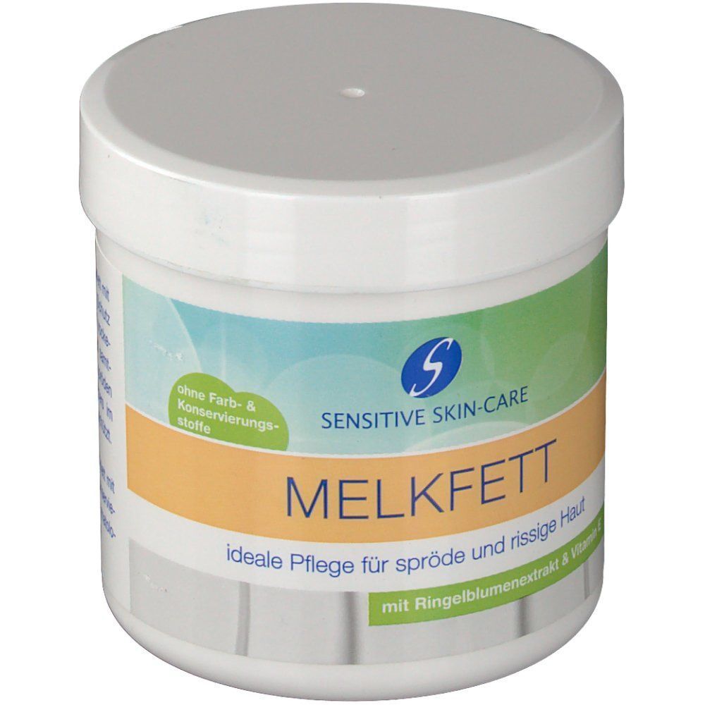 Weißer Tiegel mit Deckel. Aufschrift: SENSITIVE SKIN-CARE MELKFETT. Orangefarbener Streifen mit Text. Ohne Farb-& Konservierungsstoffe.
