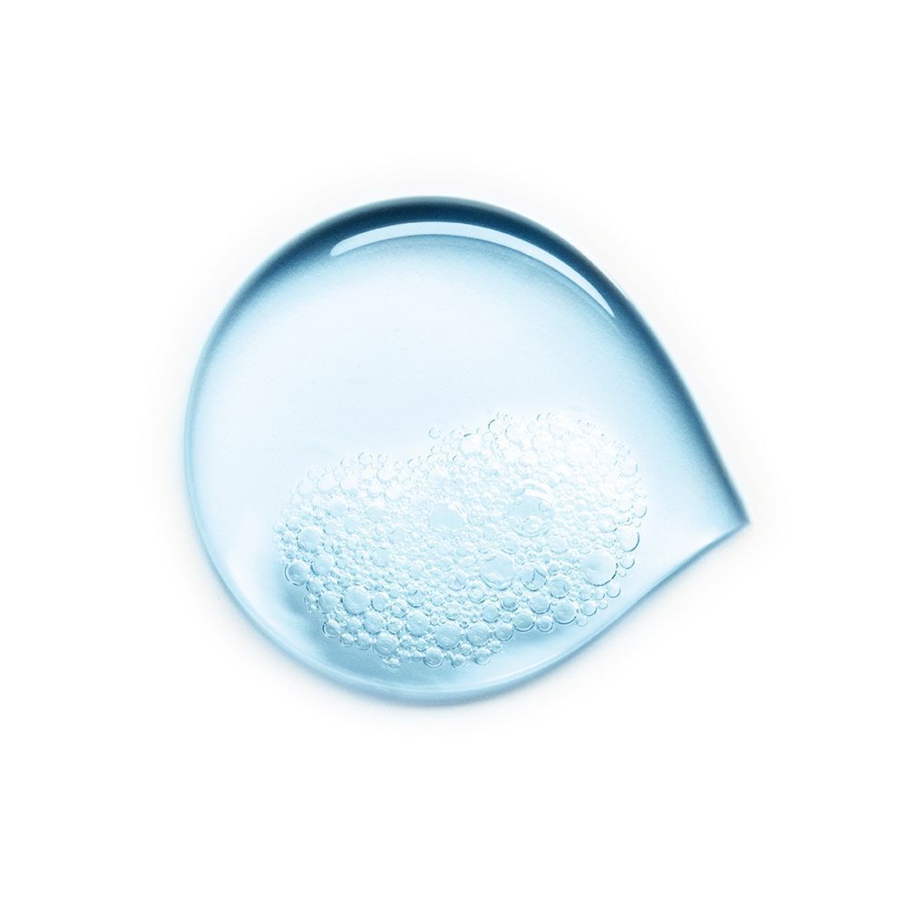 Tropfenförmige Darstellung von blauem Gel mit Schaumbläschen.