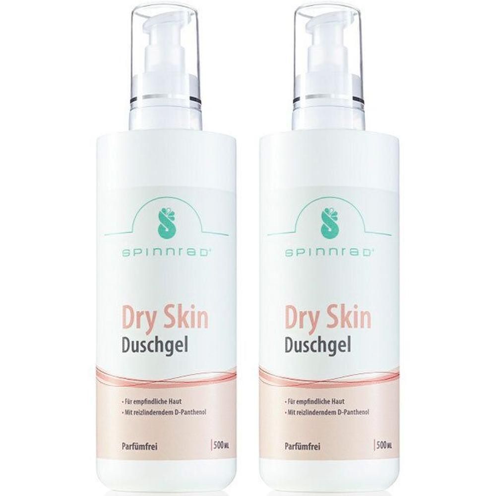 Zwei weiße Flaschen mit Pumpverschluss. Aufschrift: Spinnrad Dry Skin Duschgel. Zusätzliche Angaben: Für empfindliche Haut, parfümfrei.