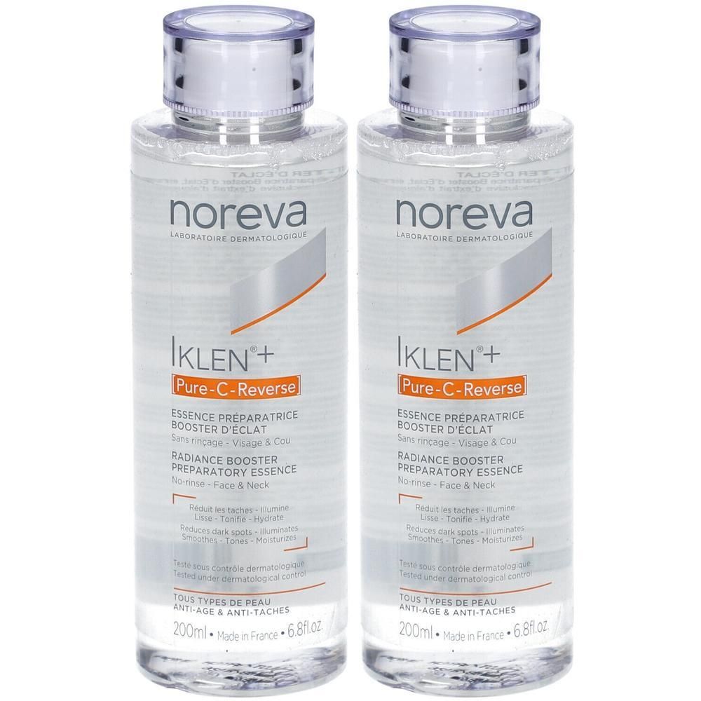Zwei Flaschen mit durchsichtiger Flüssigkeit. Aufschrift: Noreva IKLEN+ Pure-C-Reverse. Produktname und Text in französischer und englischer Sprache.