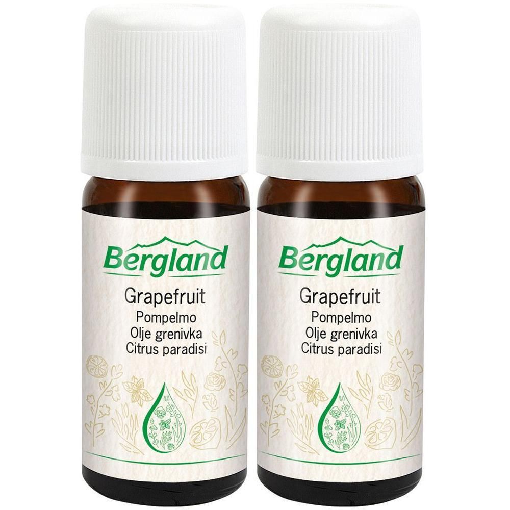 Zwei braune Glasflaschen mit weißen Deckeln. Auf den Etiketten steht "Bergland Grapefruit".