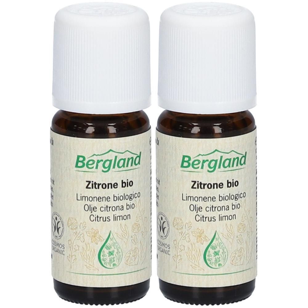 Zwei braune Glasflaschen mit weißen Deckeln. Auf den Etiketten steht "Bergland Zitrone bio".