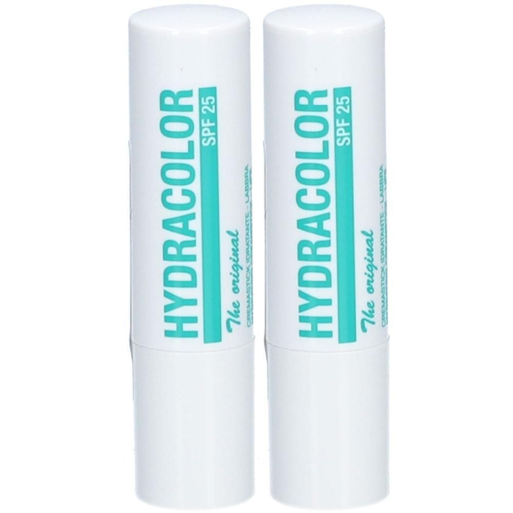 Zwei weiße Lippenpflegestifte mit türkisfarbener Schrift. Aufschrift: HYDRACOLOR SPF 25. Der Original.