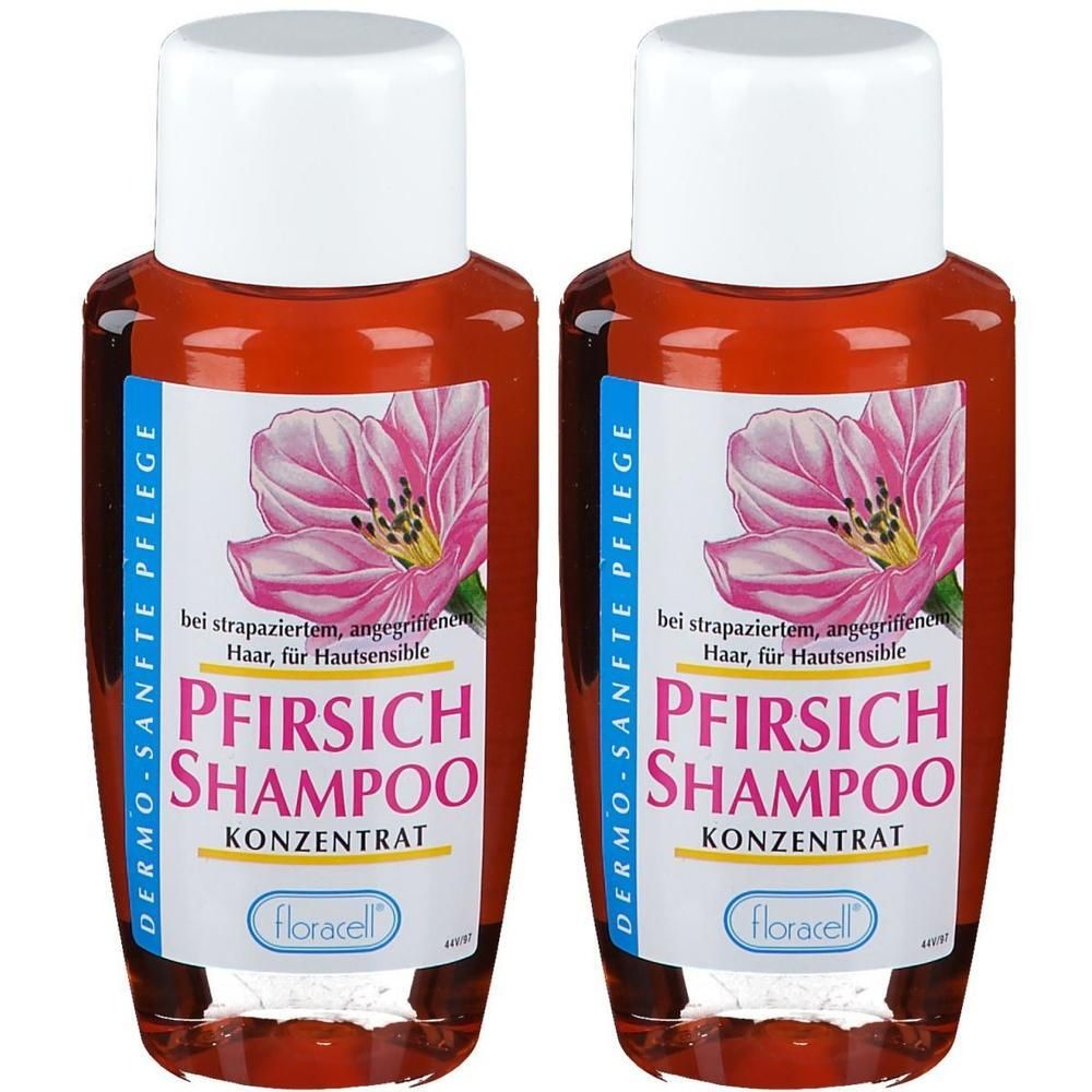 Zwei Flaschen Shampoo mit weißem Deckel. Etikett mit rosa Blüte und Schriftzug: Pfirsich Shampoo, Konzentrat. Marke: floracell.