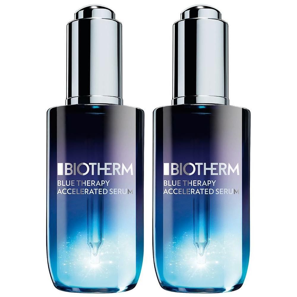 Zwei Flaschen BIOTHERM Blue Therapy Accelerated Serum. Blaue Glasflaschen mit silbernen Deckeln und Pipetten. Produktname deutlich sichtbar.