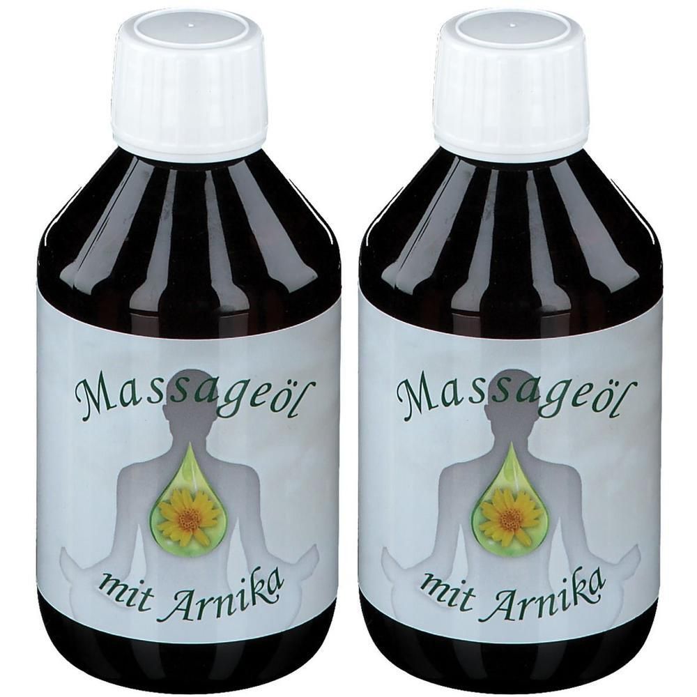 Zwei braune Glasflaschen mit weißem Schraubverschluss, gefüllt mit Massageöl mit Arnika.