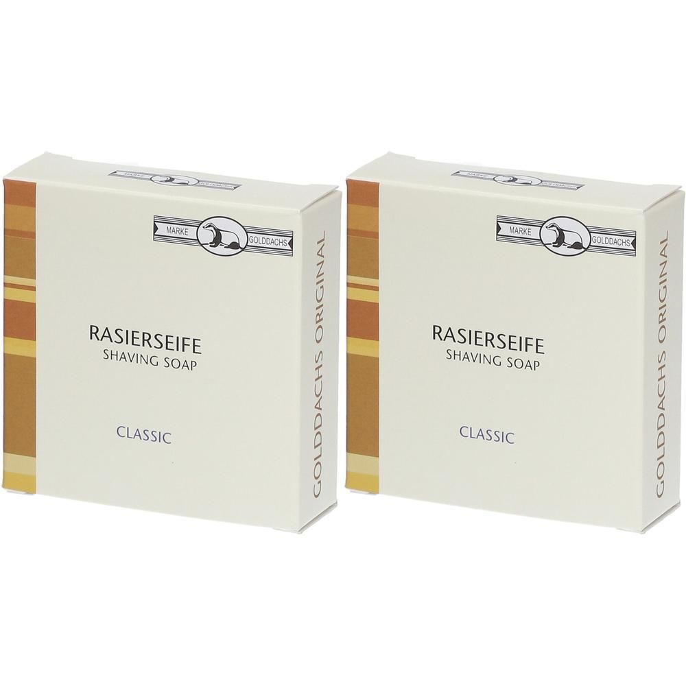 Zwei rechteckige Kartons mit Rasierseife. Aufschrift: RASIERSEIFE, SHAVING SOAP, CLASSIC. Logo mit Dachs. Golddachs Original.