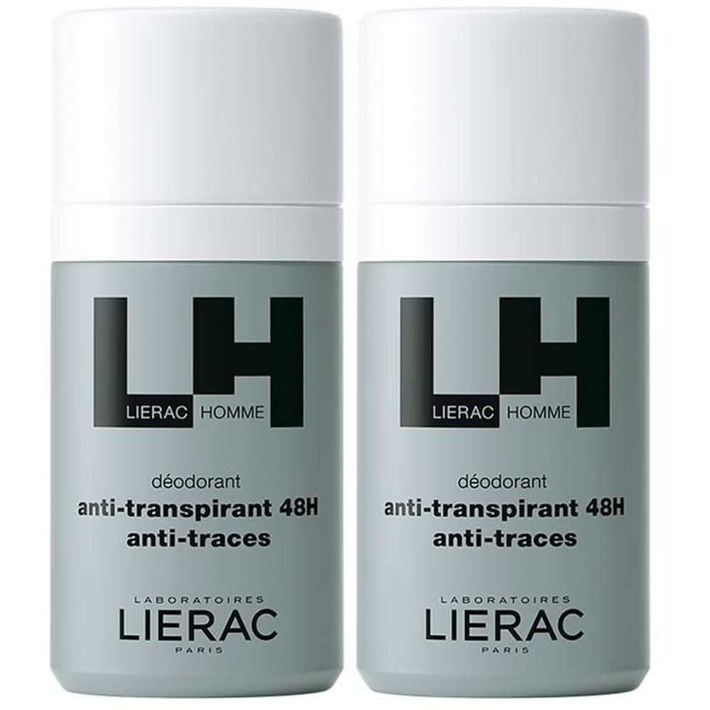 Zwei Deodorant-Flakons. Graue zylindrische Behälter mit weißem Deckel. Schwarze Schrift: LH, LIERAC HOMME, Deodorant, anti-transpirant 48H, anti-traces.