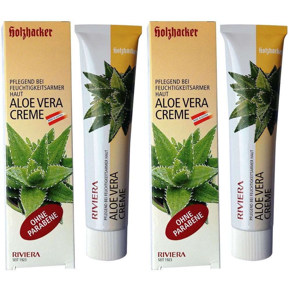 Mehrere Tuben und Verpackungen mit Aloe Vera Creme. Aufschrift: Holzhacker, Aloe Vera Creme, ohne Parabene. Verpackung mit Aloe Vera-Motiv.