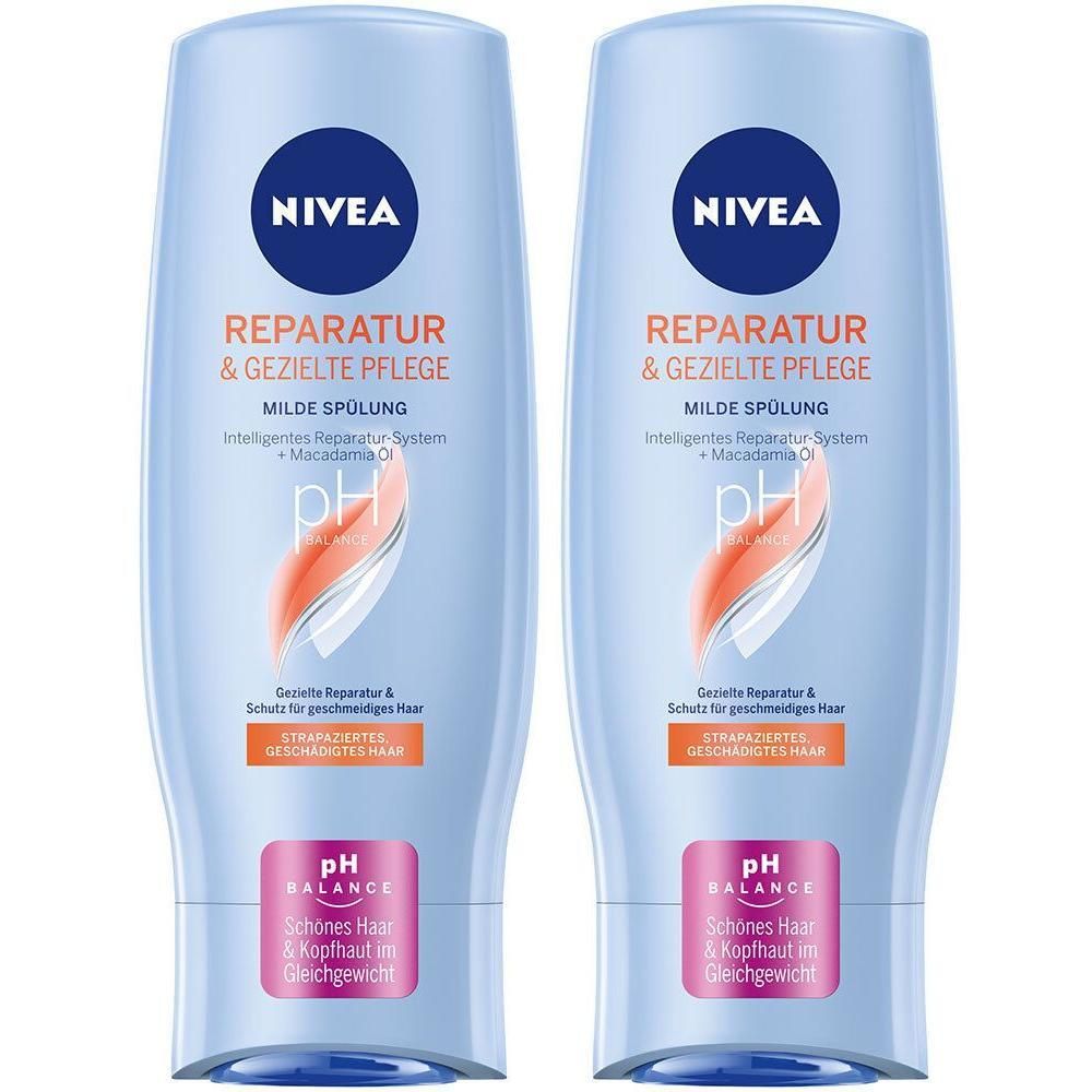 Zwei Flaschen NIVEA Spülung. Hellblaue Flaschen mit weißer Schrift. Aufschrift: Reparatur & Gezielte Pflege, milde Spülung, pH Balance.