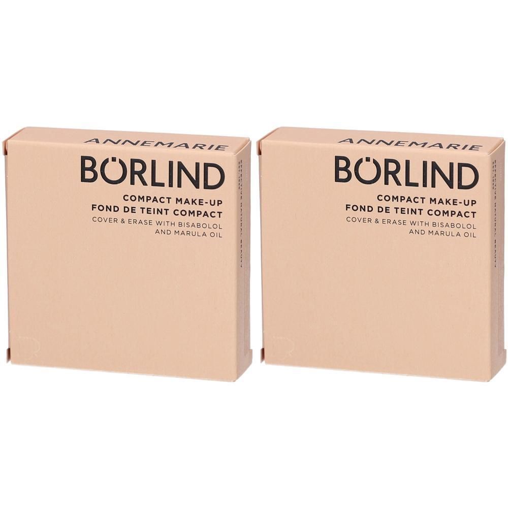 Zwei kompakte Make-ups von Börlind. Beige Verpackung mit Produktnamen und Inhaltsstoffen. Text: Compact Make-up, Fond de Teint Compact.