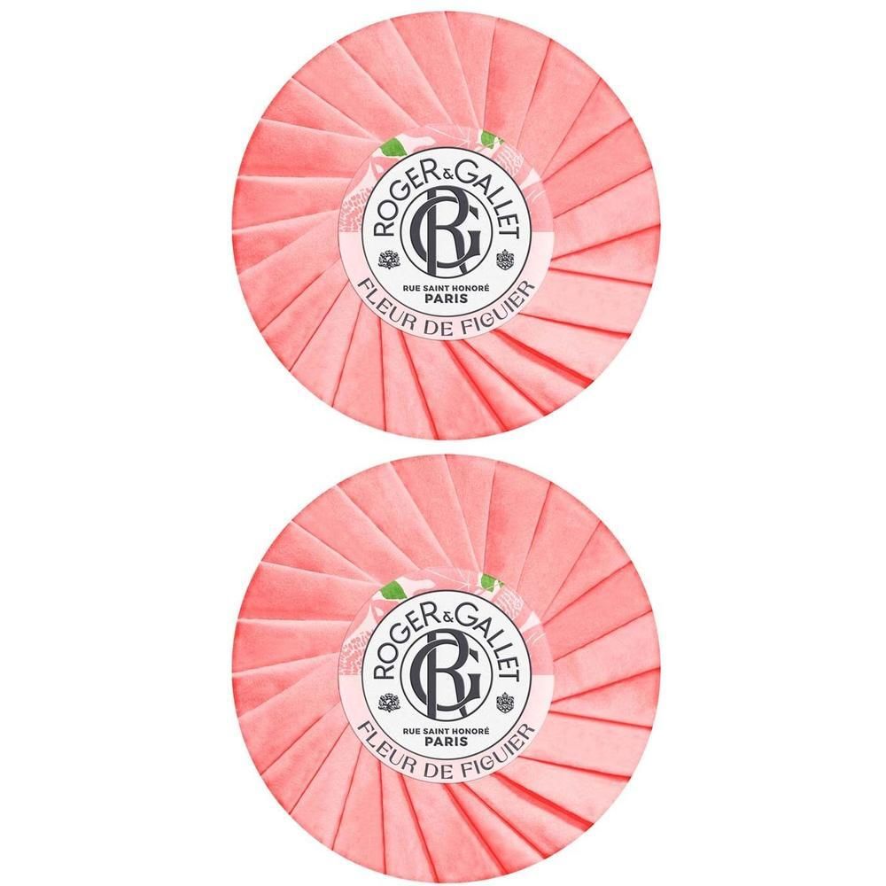 Zwei runde Seifen, rosa verpackt. Auf der Verpackung: ROGER & GALLET, Fleur de Figuier. Text in französischer Sprache.