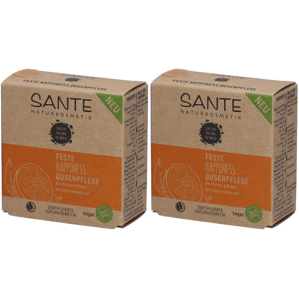 Zwei rechteckige Kartons. Aufdruck: SANTE, Feste HAPPINESS Duschpflege, Bio-Orange & Mango. Grün: Vegan, Bio. Orangefarbener Streifen mit Orangen-Illustration.