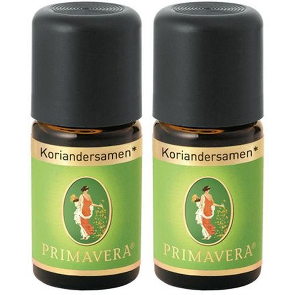 Zwei kleine braune Glasflaschen mit schwarzem Deckel. Aufschrift: Koriandersamen, PRIMAVERA. Grünes Etikett mit Frau.