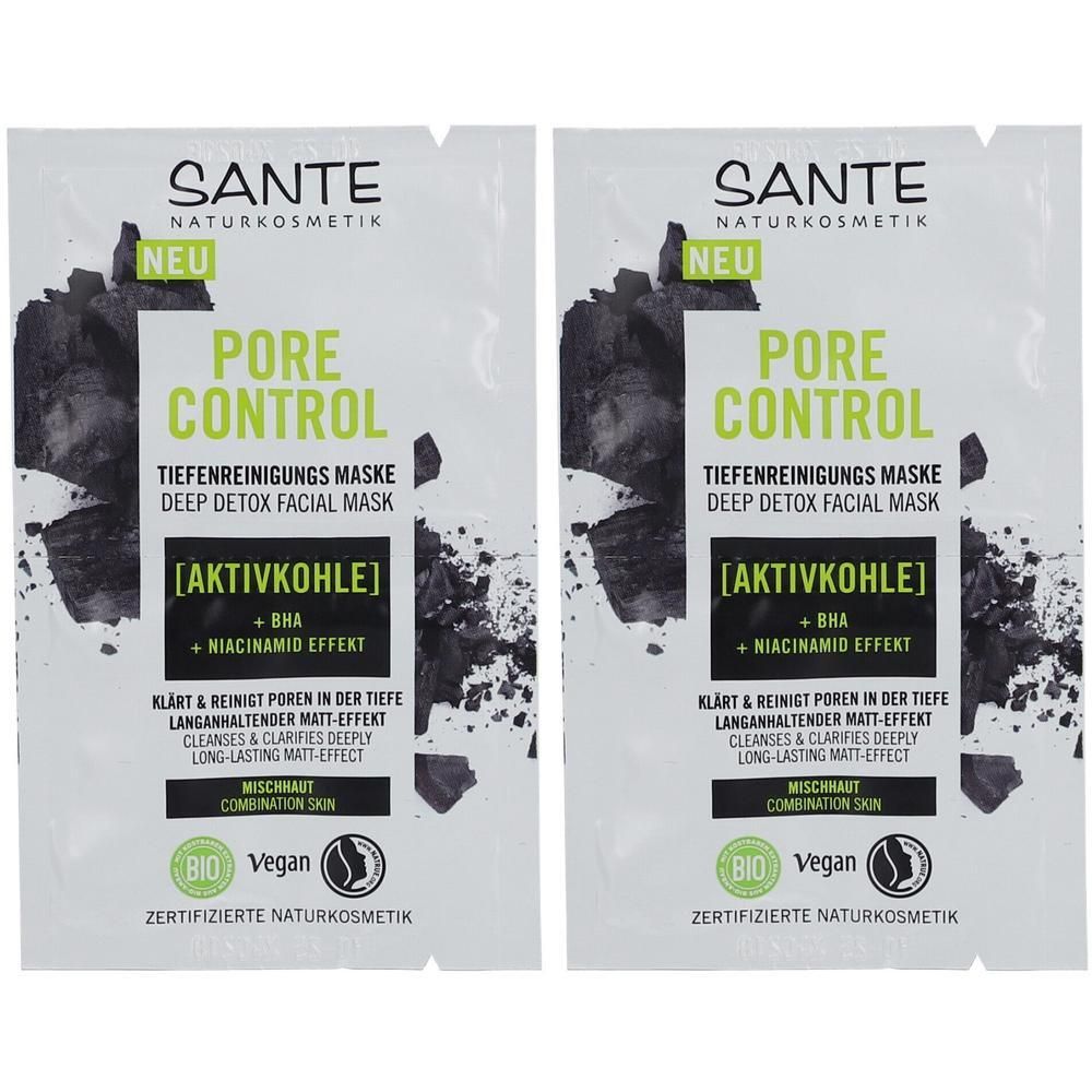 Zwei Beutel mit Gesichtsmaske. Aufschrift: PORE CONTROL, Aktivkohle, BHA, Niacinamid. Bio- und Vegan-Siegel.