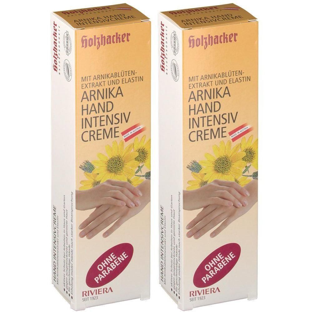 Zwei Kartons RIVIERA Arnika Hand intensiv Creme. Aufdruck: Arnika Hand intensiv Creme, ohne Parabene. Sonnenblumen- und Hand-Illustrationen.