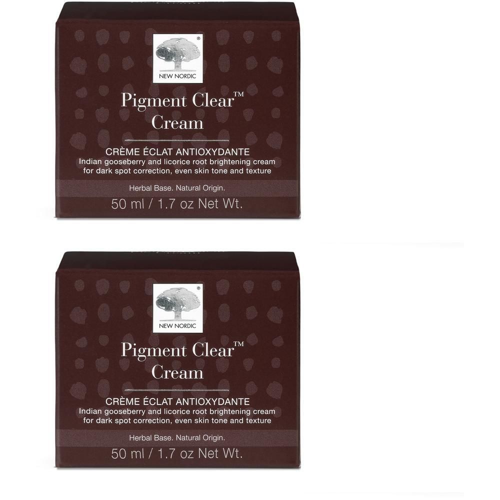 Zwei Schachteln PIGMENT Clear Cream. Braune Verpackung mit weißer Schrift. Text: Creme Eclat Antioxydante. 50 ml / 1.7 oz Net Wt.