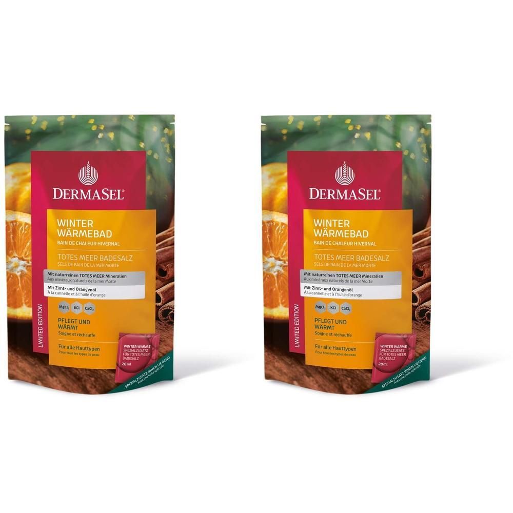 Zwei Beutel DermaSel® Winter Wärmebad. Grün-orange Verpackung mit Produktinformationen. Abgebildet sind Orangen und Zimtstangen.