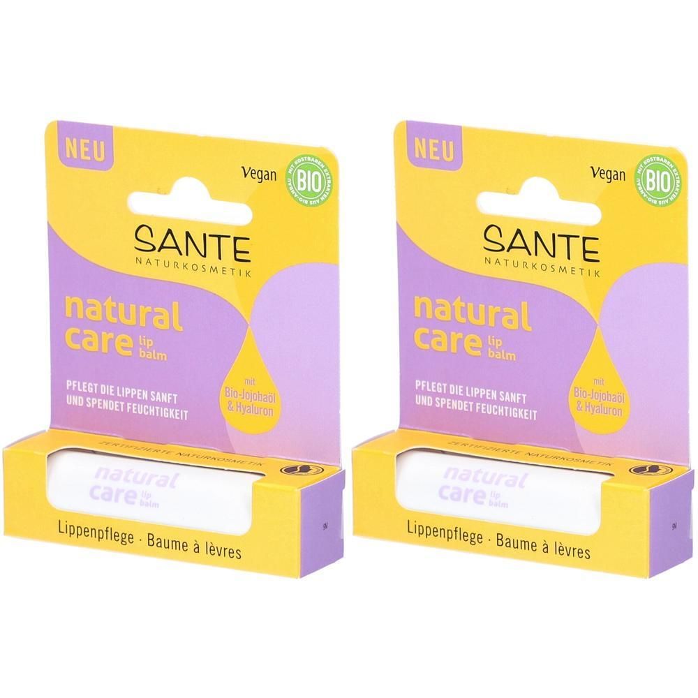 Zwei Lippenbalsam-Verpackungen. Gelbe und violette Kartons mit Produktnamen und Logo. Vegan- und Bio-Siegel.