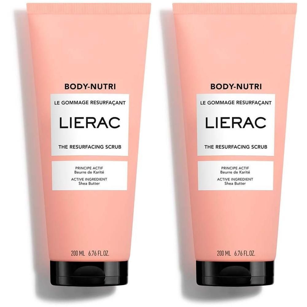 Zwei Tuben Körperpeeling. Rosa Tuben mit schwarzem Deckel. Text: BODY-NUTRI, LIERAC, THE RESURFACING SCRUB, 200 ml.