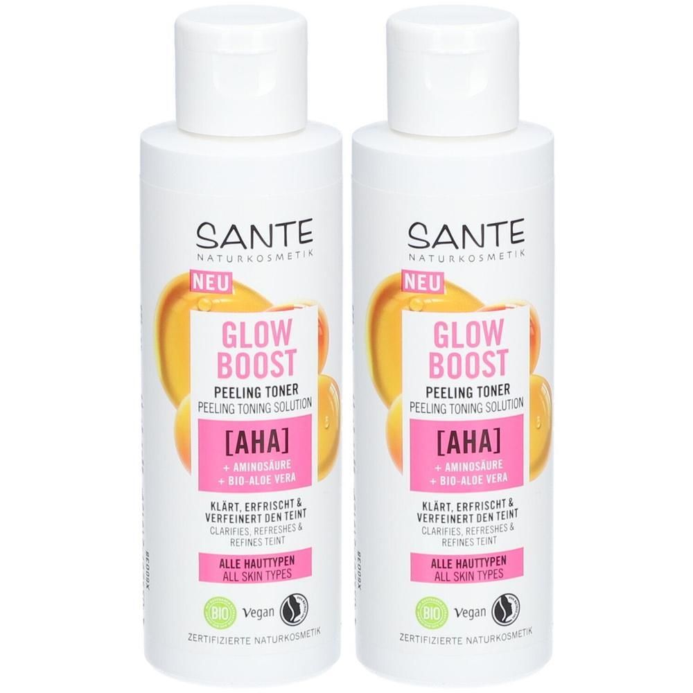 Zwei weiße Flaschen mit weißem Deckel. Aufschrift: GLOW Boost Peeling Toner, AHA, Aminosäure & Bio-Aloe Vera. Vegan-Siegel.