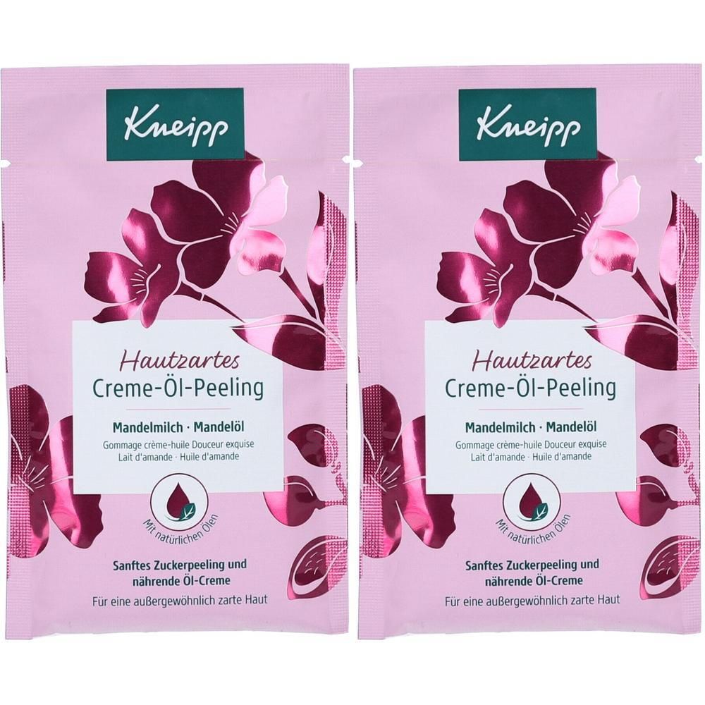 Zwei Hautzartes Creme-Öl-Peeling-Beutel. Marke Kneipp. Rosa Verpackung mit floralem Design und Produktbezeichnung. Enthält Mandelmilch und Mandelöl.
