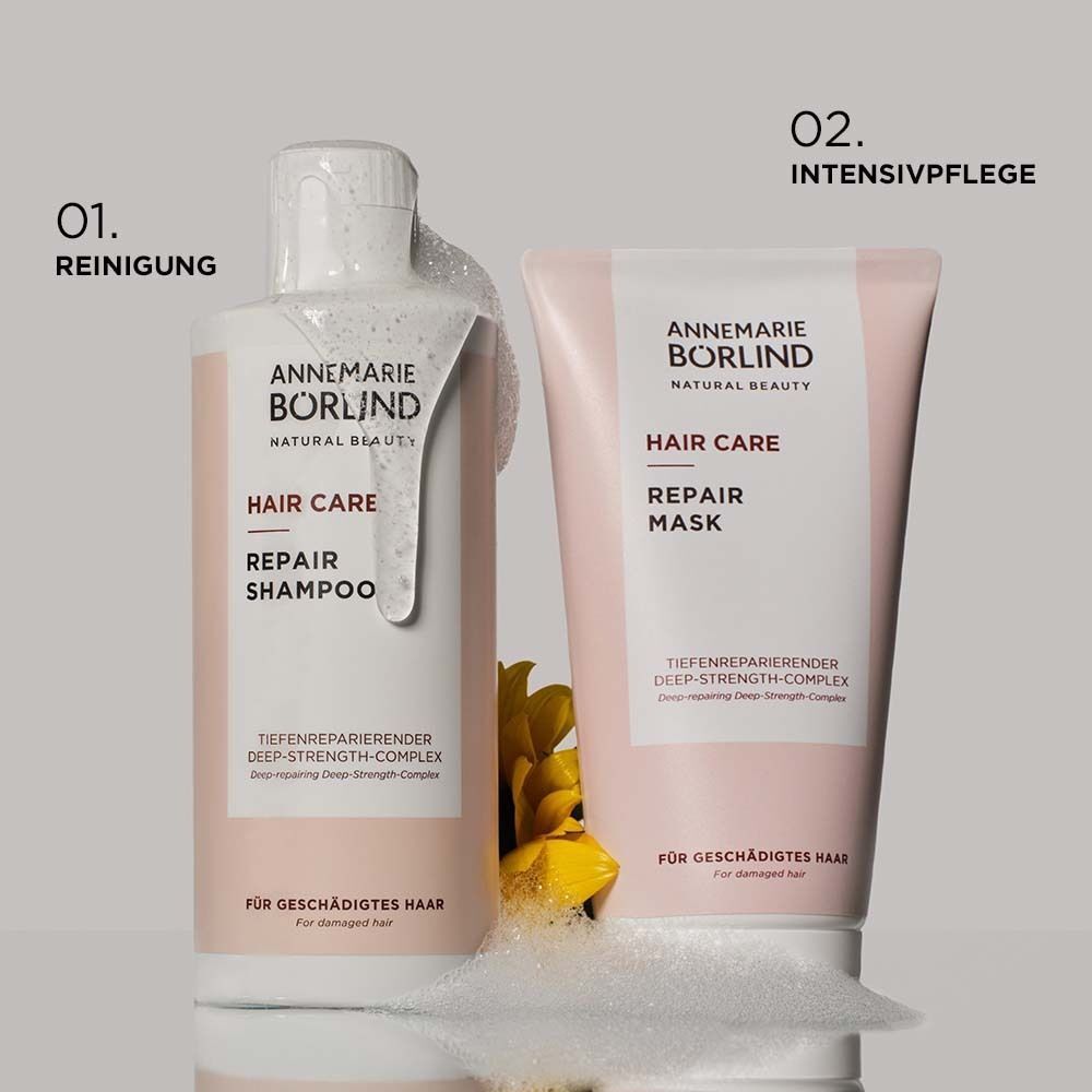 Shampoo und Repair Maske. Beide Produkte mit Schaum. Text: Hair Care Repair Shampoo und Repair Mask.
