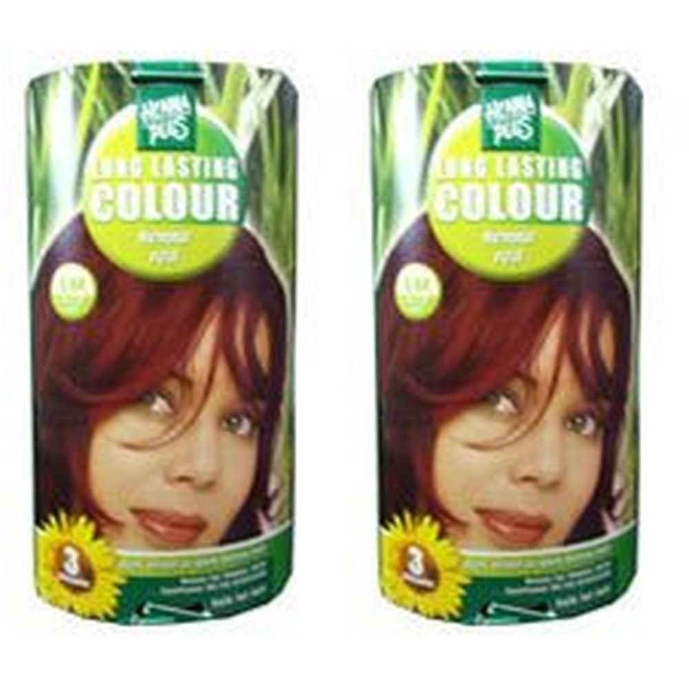 Zwei zylindrische Verpackungen. Auf jeder Verpackung ist ein Frauenporträt mit roten Haaren abgebildet. Text: Long Lasting Colour.