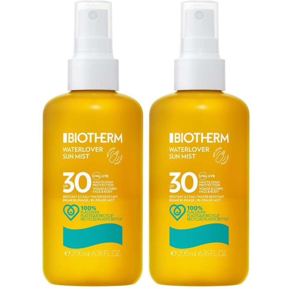 Zwei gelbe Sprühflaschen mit weißem Sprühkopf. Auf jeder Flasche steht "BIOTHERM WATERLOVER SUN MIST 30".
