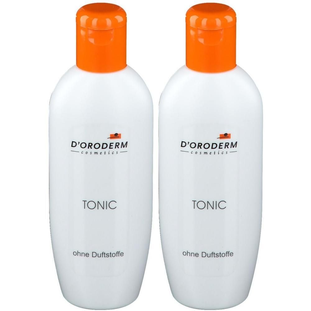 Zwei weiße Flaschen mit orangefarbenen Deckeln. Aufschrift: D'ORODERM cosmetics, TONIC, ohne Duftstoffe.