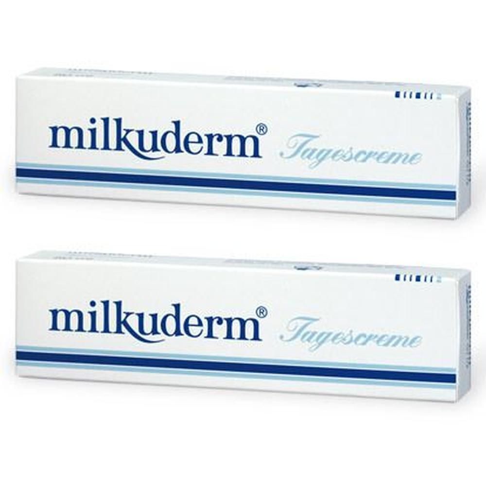 Zwei weiße Schachteln mit blauem Streifen und Schriftzug milkuderm® Tagescreme. Aufschrift in blauer Schrift.