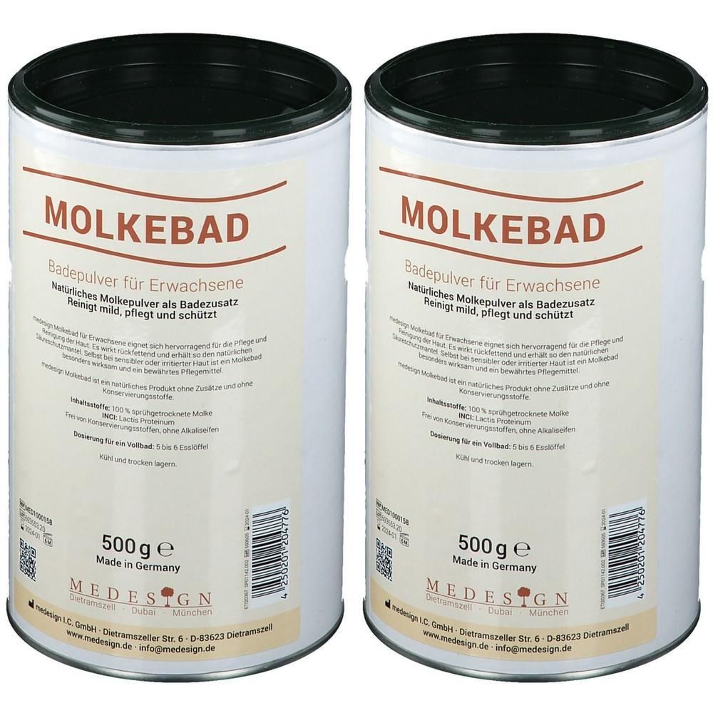 Zwei zylindrische Dosen mit schwarzem Deckel. Aufschrift: MOLKEBAD, Badepulver für Erwachsene. 500g. Marke MEDESIGN. Hergestellt in Deutschland.