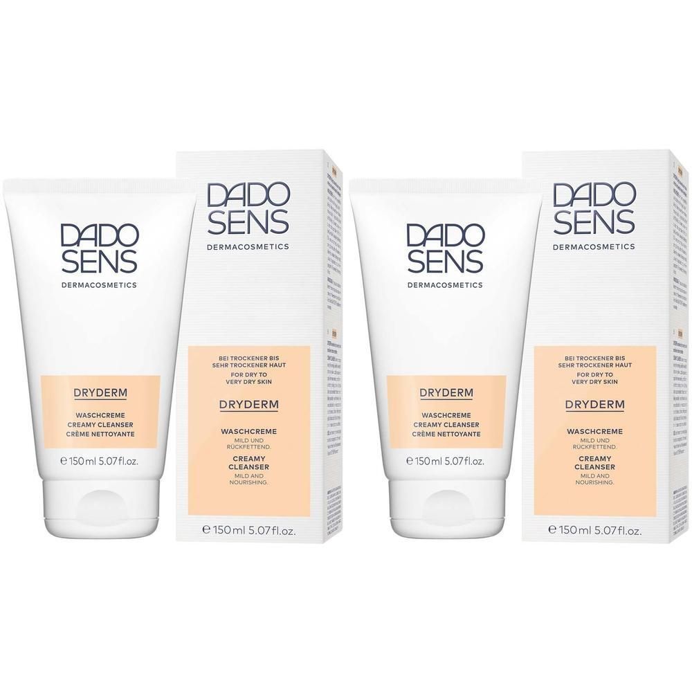 Zwei Tuben und Kartons von DADO SENS DRYDERM Waschcreme. Weiße Tuben mit hellbraunen Akzenten und Schriftzug. Kartons mit Produktinformationen.