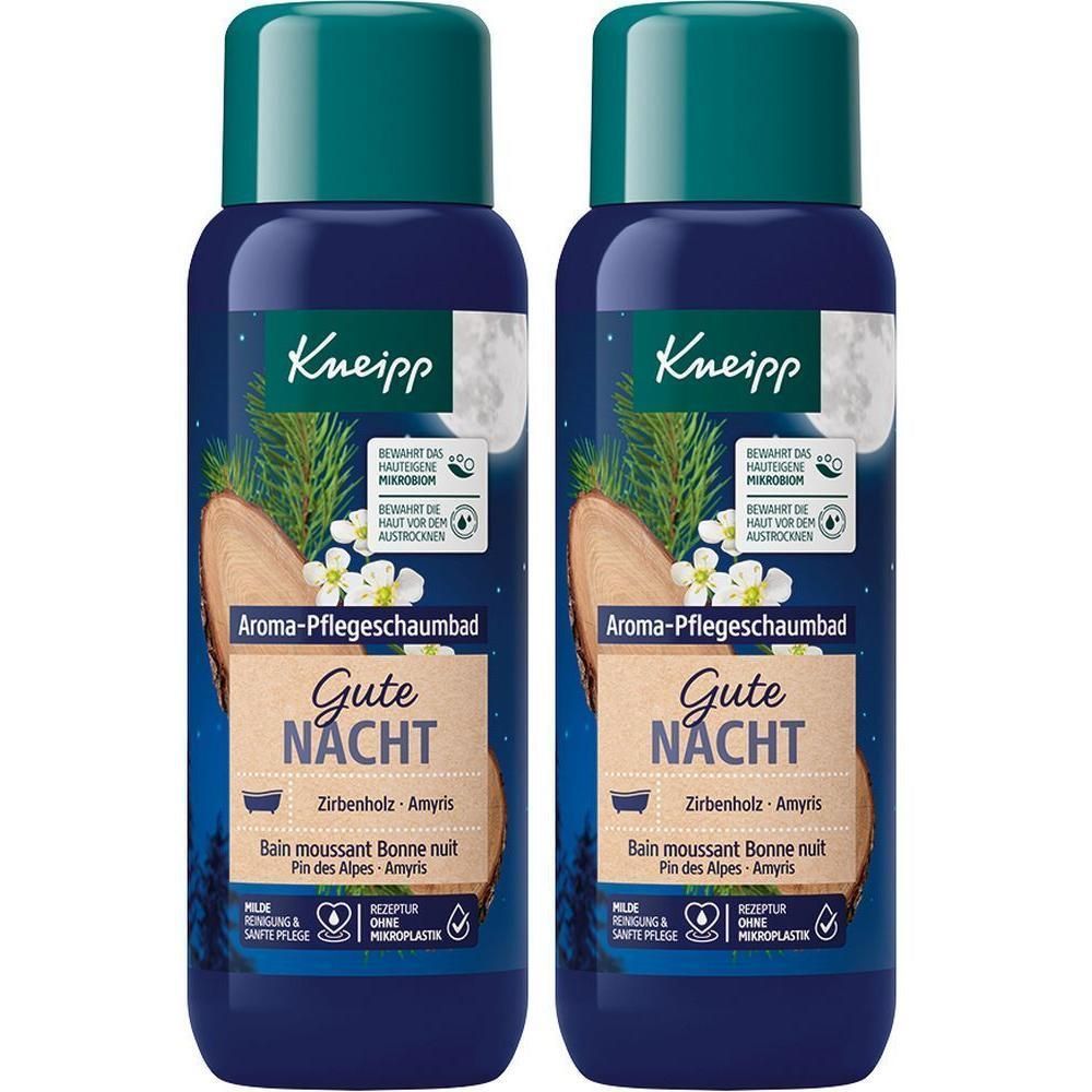 Zwei blaue Flaschen mit grünem Deckel. Aufschrift: Aroma-Pflegeschaumbad Gute Nacht. Zirbenholz-Amyris.