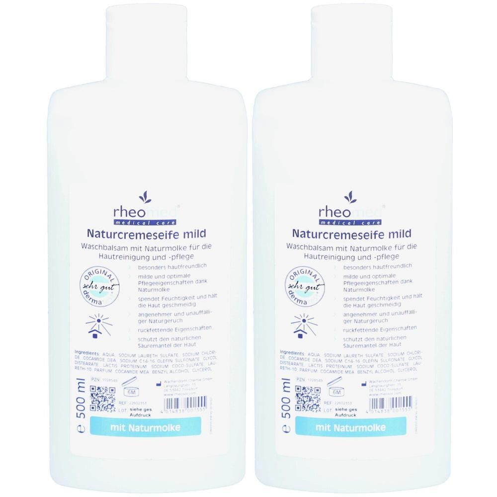 Zwei weiße Flaschen Rheo Naturcremeseife mild, je 500 ml, mit Etikett.