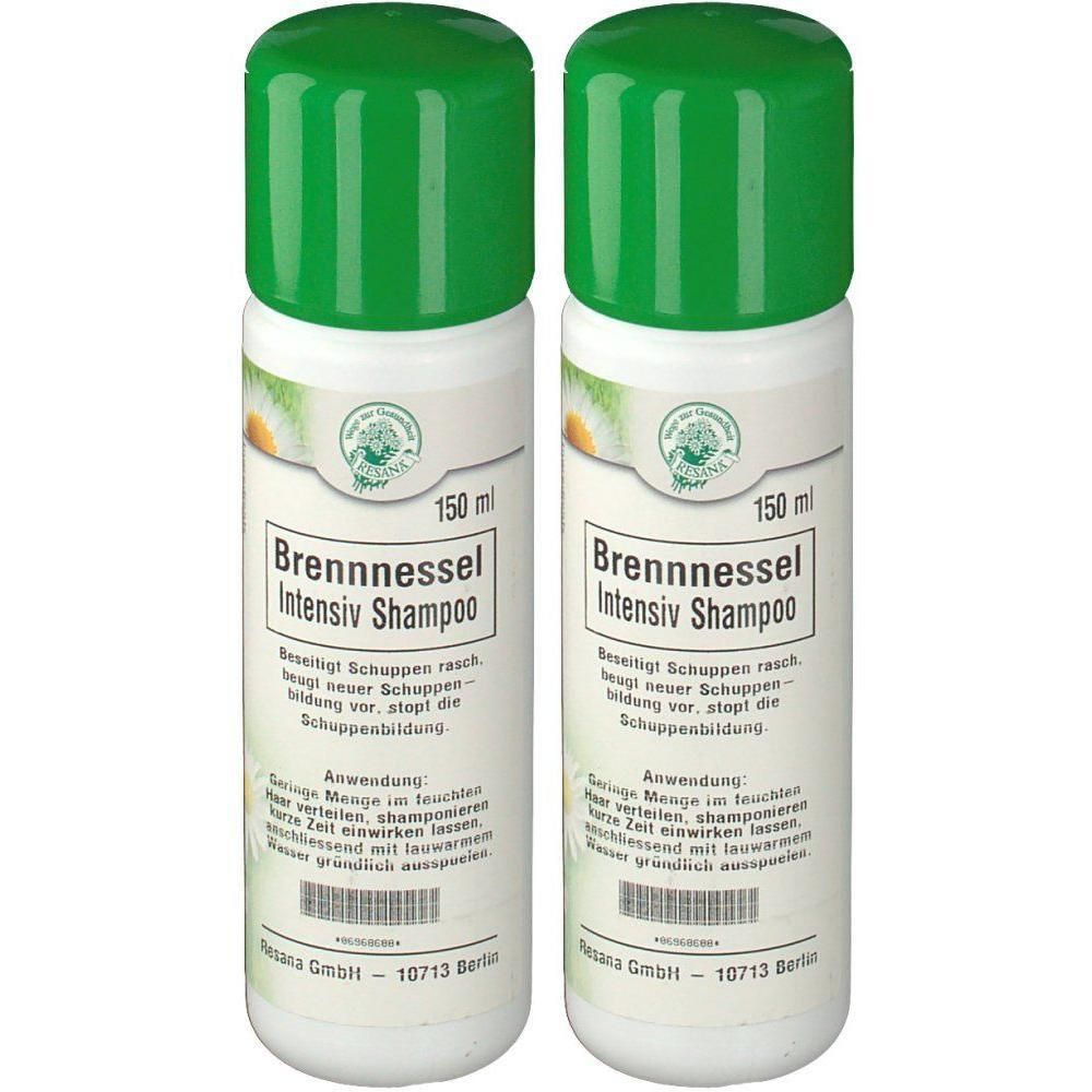 Zwei Flaschen Shampoo mit grünen Deckeln. Aufschrift: Brennnessel Intensiv Shampoo. 150 ml.