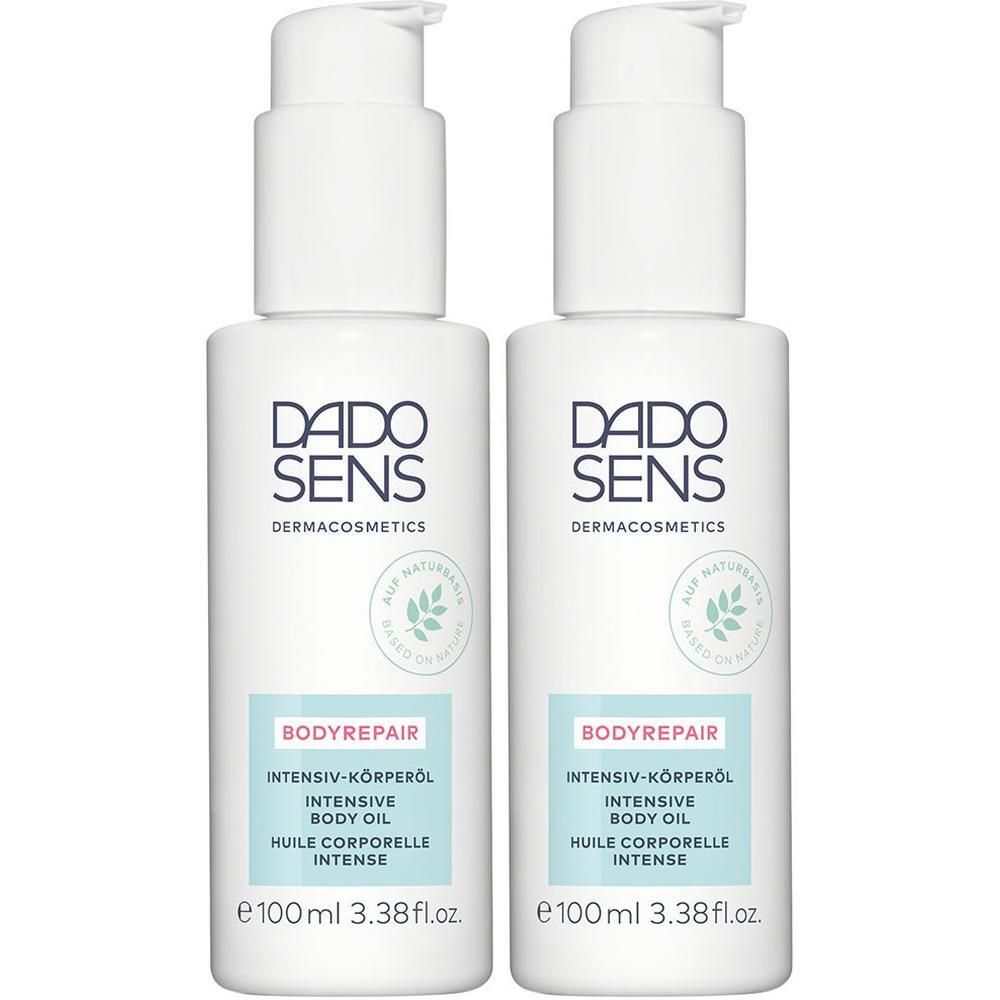 Zwei weiße Pumpflaschen DADO SENS BODYREPAIR Intensiv-Körperöl, 100ml.