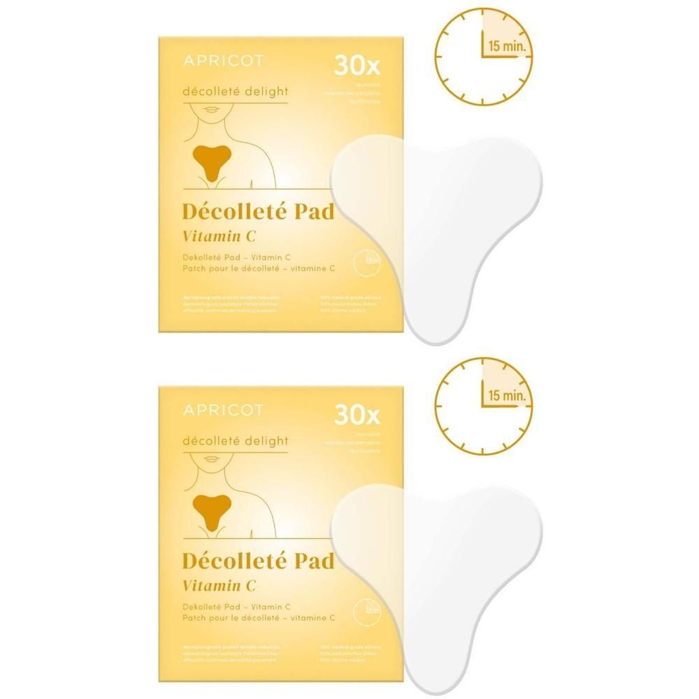Zwei Kartons und zwei Dekolleté Pads. Aufdruck: APRICOT, Décolleté Pad Vitamin C. Zeitanzeige: 15 Minuten.