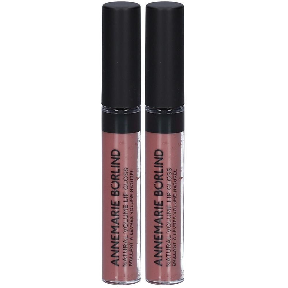 Zwei Lipgloss-Tuben mit schwarzem Deckel. Aufschrift: ANNEMARIE BÖRLIND NATURAL VOLUME LIP GLOSS. Farbton: Nude.