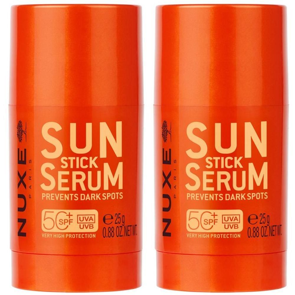Zwei NUXE SUN Sonnenstick Seren LSF50+ in orangefarbener Verpackung, je 25g.