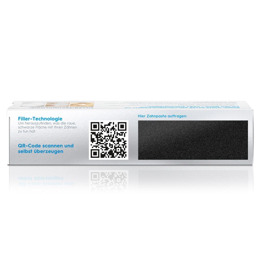 Rückseite des Bioniq White Filler Zahnpasta-Kartons. QR-Code und schwarze Fläche. Text: Hier Zahnpasta auftragen.