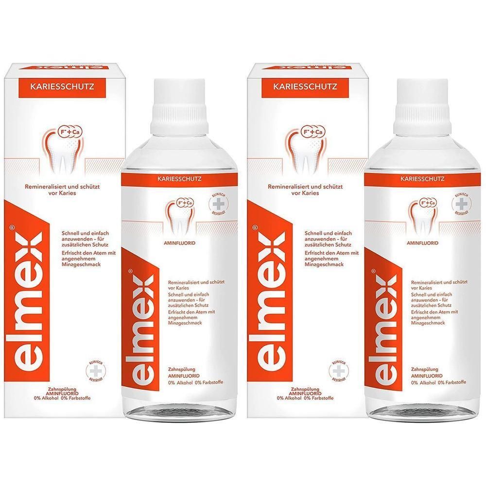 Mehrere Flaschen und Verpackungen von elmex Kariesschutz Zahnspülung. Flaschen und Kartons sind weiß und orange.
