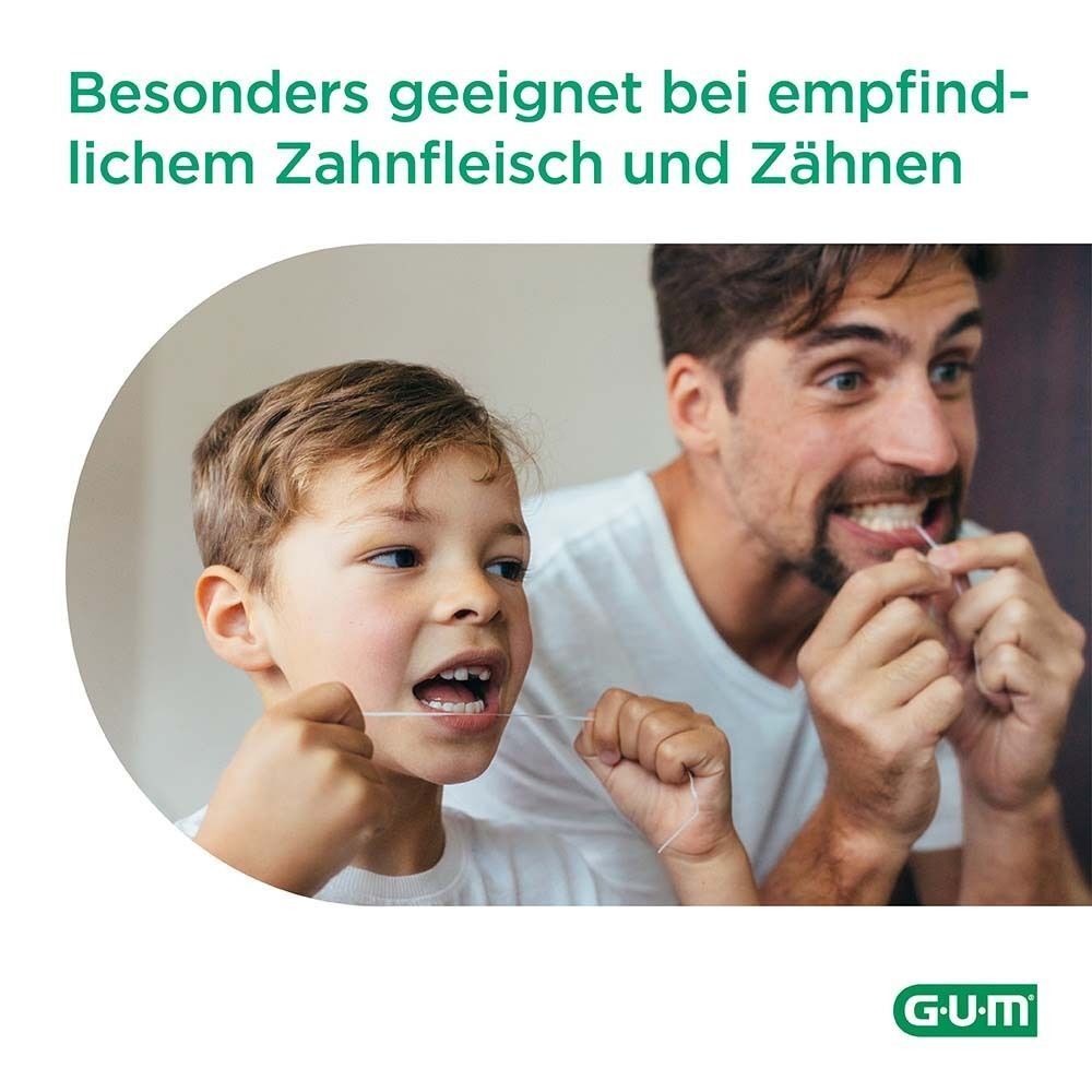 Ein Mann und ein Kind benutzen Zahnseide. GUM-Logo unten rechts.