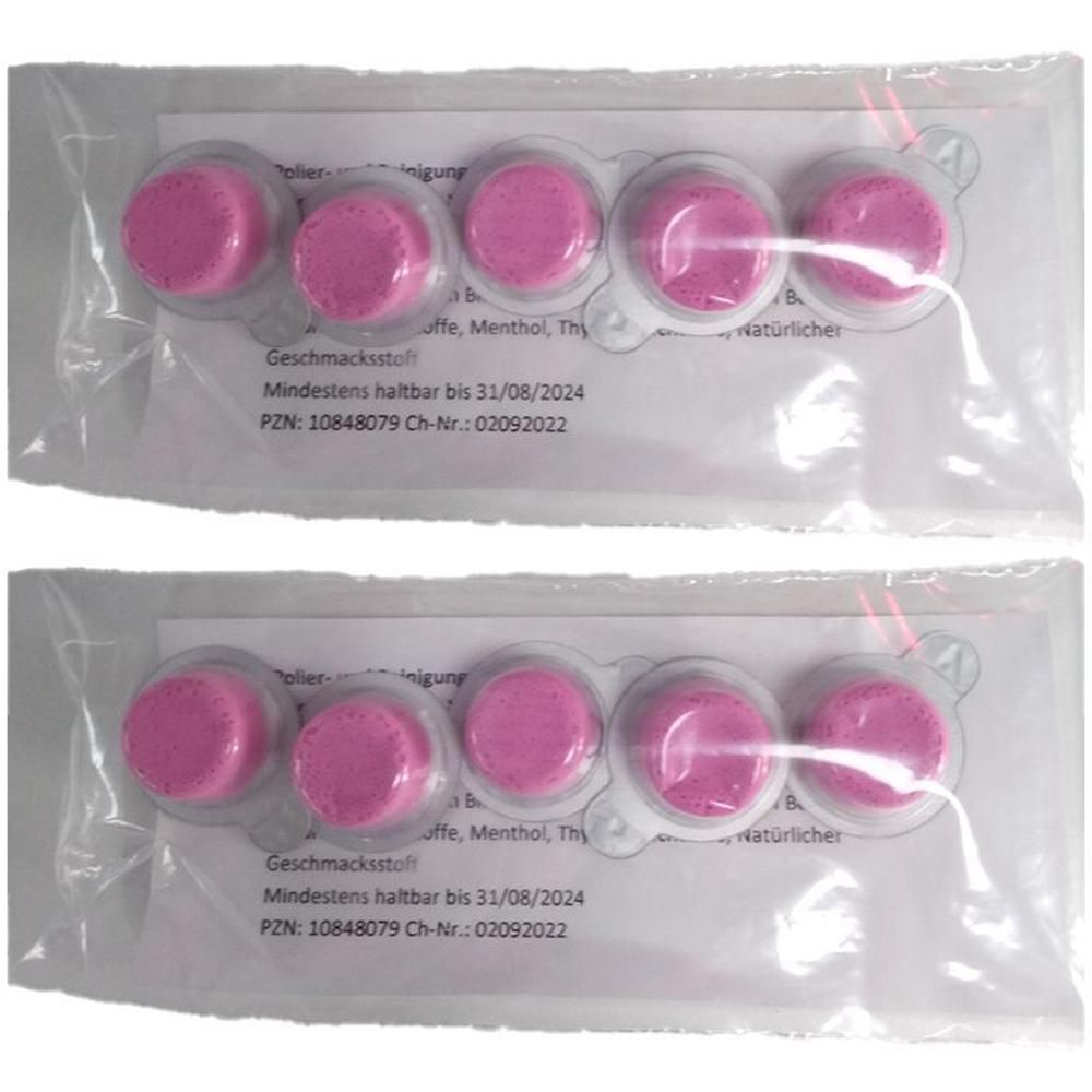 Zwei Blisterpackungen mit je fünf rosa Tabletten. Klarsichtverpackung mit Text. Haltbarkeitsdatum und Chargennummer sichtbar.