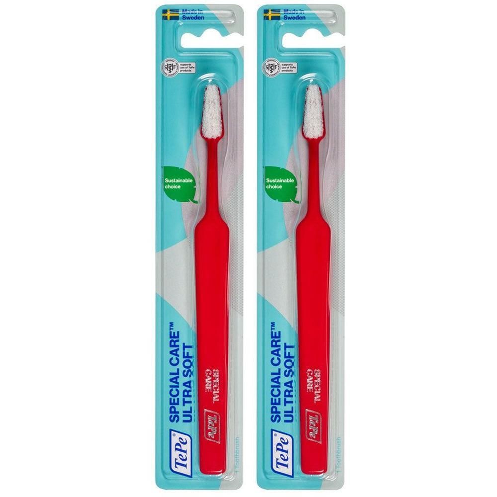 Zwei Zahnbürsten in Verpackung. Roter Griff, weißer Bürstenkopf. Text: SPECIAL CARE ULTRA SOFT, TePe.
