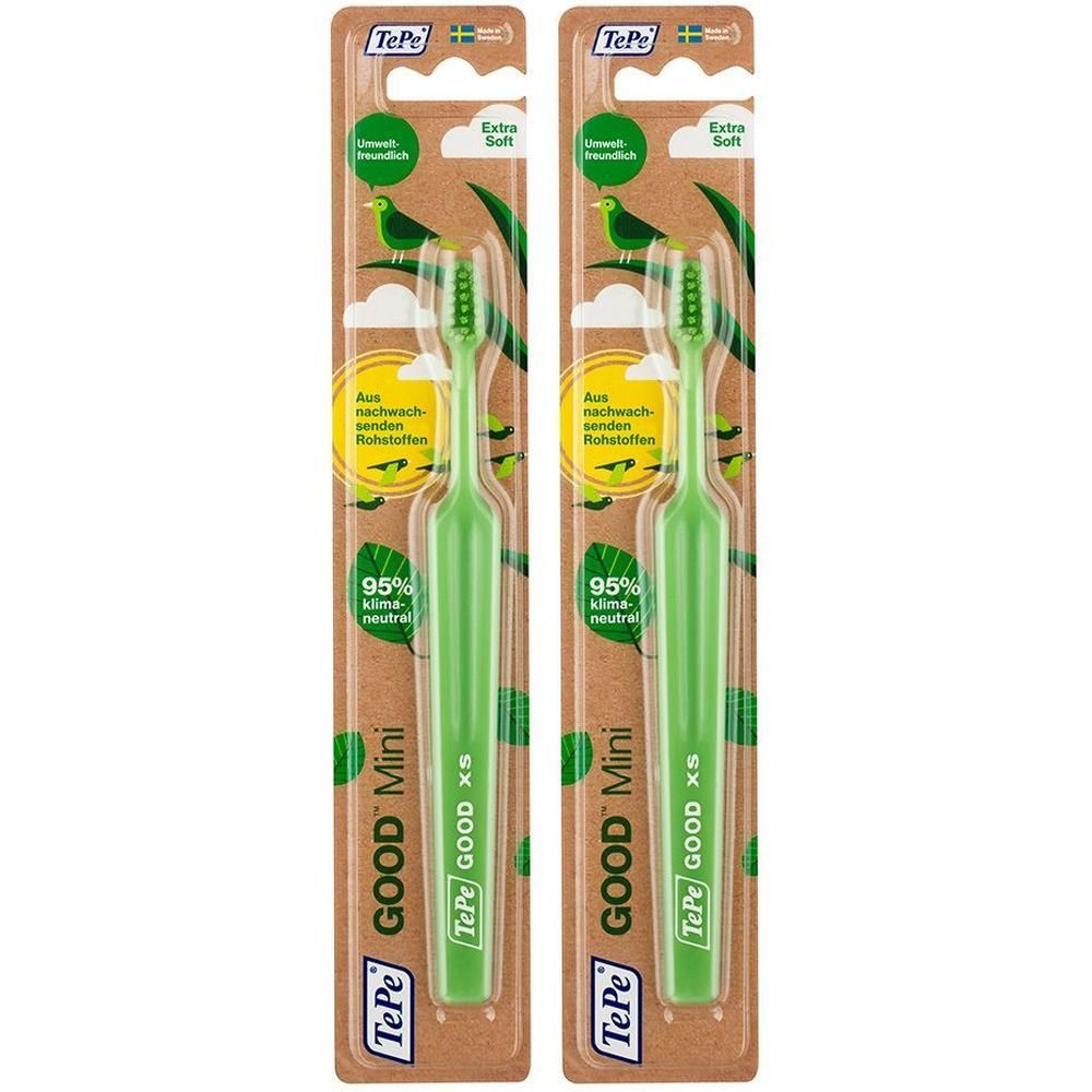 Zwei grüne Zahnbürsten in Verpackung. Aufschrift: TePe GOOD Mini, Extra Soft, 95% klimaneutral. Verpackung aus nachwachsenden Rohstoffen.